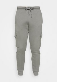 Graue Jogginghosen aus weichem Stoff mit schmal zulaufendem Schnitt, elastischem Bund mit Kordelzug und seitlichen Cargotaschen.