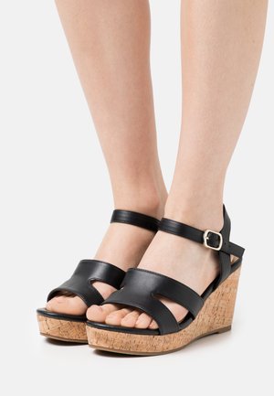 Sandalen met plateauzool - black