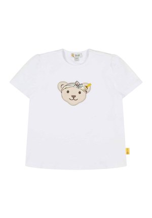 Weißes Baumwoll-T-Shirt mit kurzen Ärmeln, das ein strukturiertes, besticktes Bärenface mit einem Stirnband und einem kleinen gelben Etikett zeigt.