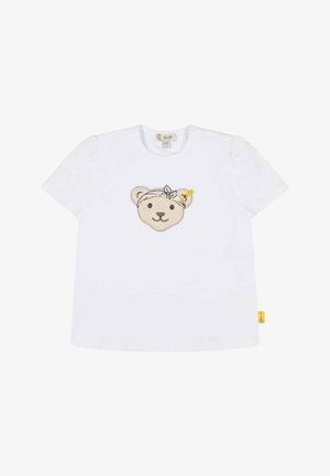 T-shirt bianco in cotone con maniche corte, caratterizzato da un volto di orso ricamato e texturizzato con una fascia per capelli e una piccola etichetta gialla.