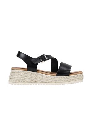 Black leather wedge sandal with two cross straps, adjustable ankle buckle, and braided jute platform. Textured sole for grip.