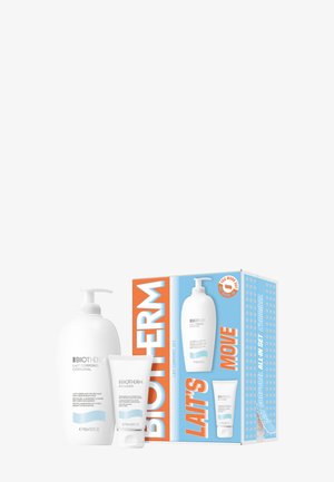 Leche corporal hidratante Biotherm Lait Corporel 400 ml con crema de manos Biomains 50 ml en caja de embalaje de marca azul y naranja.