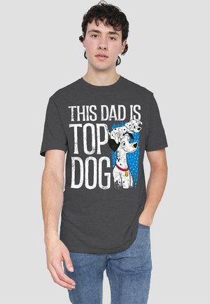 Dark gray cotton t-shirt featuring a graphic of a dog and text "THIS DAD IS TOP DOG" in white, with blue accent and polka dot background.