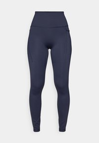 Navy high-waisted leggings made of stretch fabric, featuring a sleek design with side pockets and flat seams for comfort.