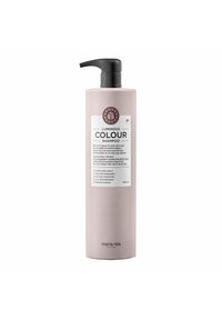 Roze, matte plastic fles Luminous Colour Shampoo met pompdispenser; witte label met merknaam en belangrijke ingrediënten; 1000 ml.