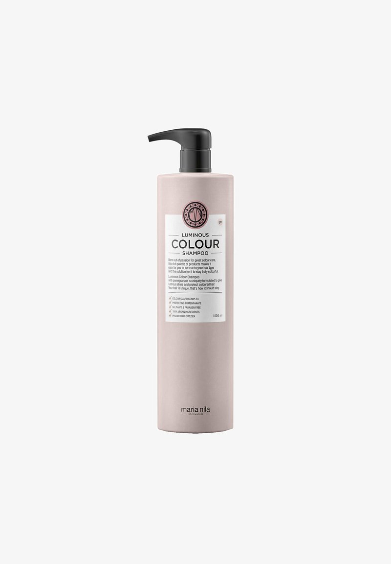 Roze, matte plastic fles Luminous Colour Shampoo met pompdispenser; witte label met merknaam en belangrijke ingrediënten; 1000 ml.