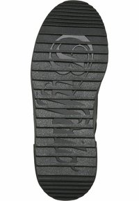 Semelle de chaussure en caoutchouc noir avec motifs d'adhérence texturés, comprenant des rainures horizontales et un détail de logo circulaire au centre.
