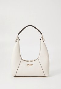 White textured handbag with black accents, curved shape, gold hardware, and logo. Features a short handle for carrying.