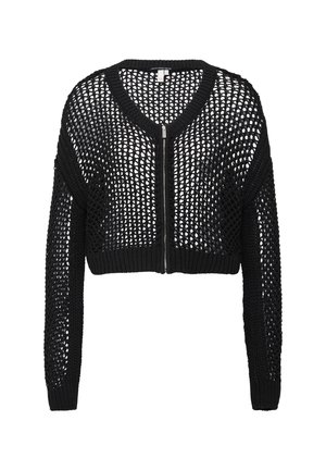 Schwarze, kurze Strickjacke mit großem Lochmuster, langen Ärmeln, einem V-Ausschnitt und einem Reißverschluss vorne. Strukturierter Strickstoff.
