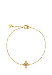 Gold chain bracelet featuring a star-shaped charm with a central clear stone. Secure lobster clasp and adjustable length.