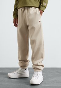 Champion ICONS CUFF PANTS CONTRAST LOGO UNISEX - Treniņtērpa apakšdaļas - beige