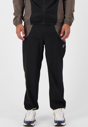 RFLCT  - Tracksuit bottoms - black