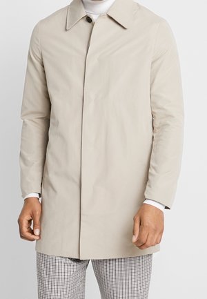 Halflange jas - beige