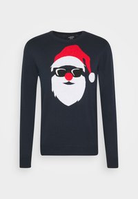 Marinblå tröja med en tomtedesign som har en röd hatt, svarta solglasögon och en röd näsa. Mjuk stickad tyg med långa ärmar och rundad halsringning.