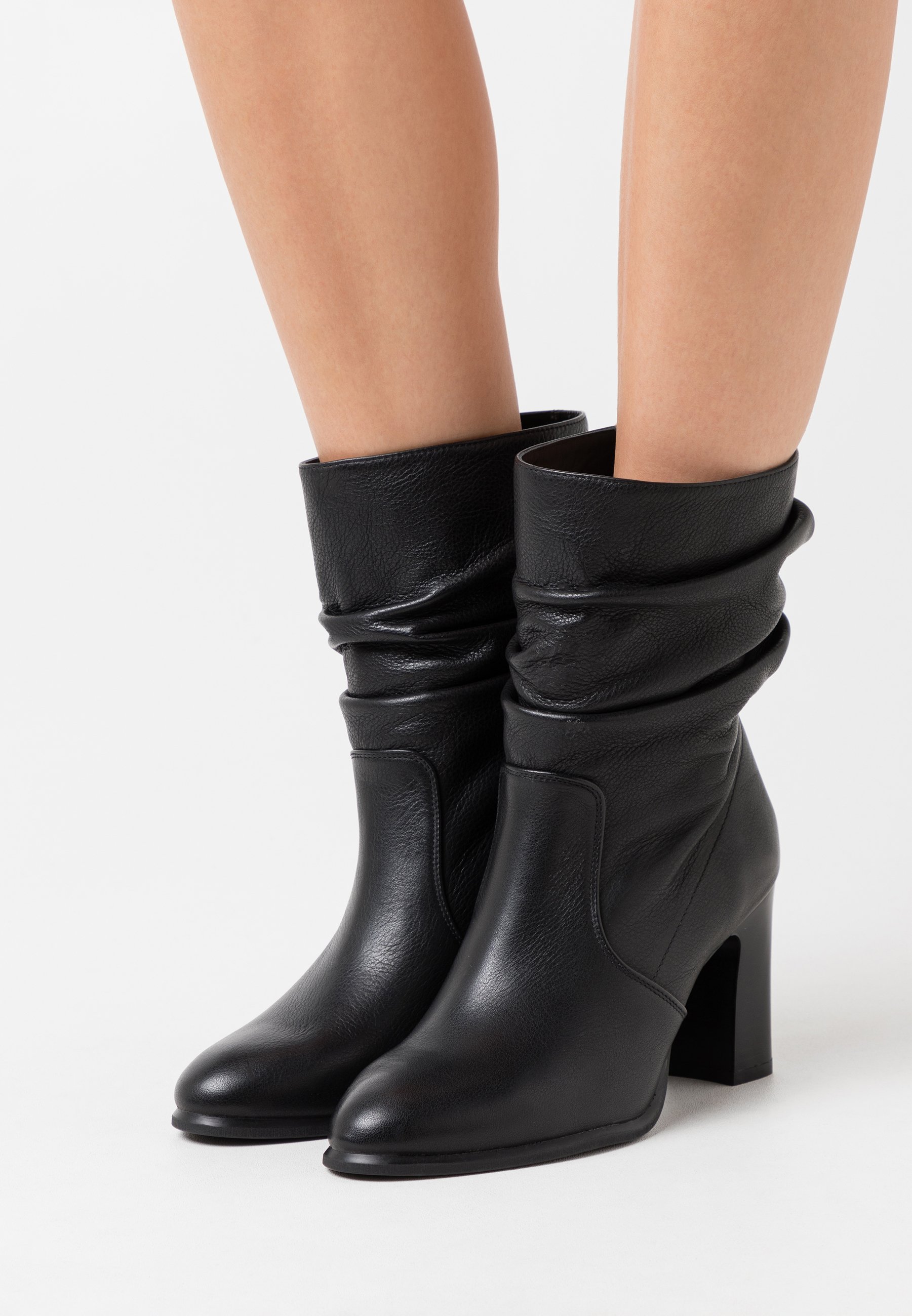 unisa stiefel schwarz wildleder