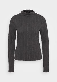 Mørkegrå langermet turtleneck genser med teksturert ribbestrikket design og en tettsittende fasong. Flat kant og sømløse mansjetter.