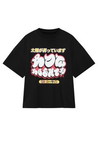 Black short-sleeve T-shirt with oversized fit, front graphic in bright colors featuring stylized Japanese text and bold lettering.