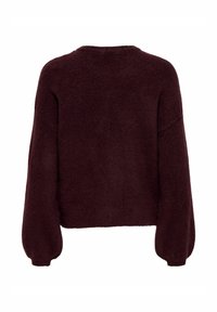 Bordeauxfarbener Oversize-Pullover mit Rundhalsausschnitt und langen Puffärmeln, aus weichem, strukturiertem Strickstoff gefertigt und mit einem verkürzten Saum.