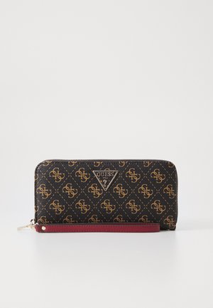 Črna denarnica z zlatim monogramskim vzorcem. Ima burgundski poudarek in srebrno logotipno ploščico. Zadrga za zapiranje in pašček za zapestje.