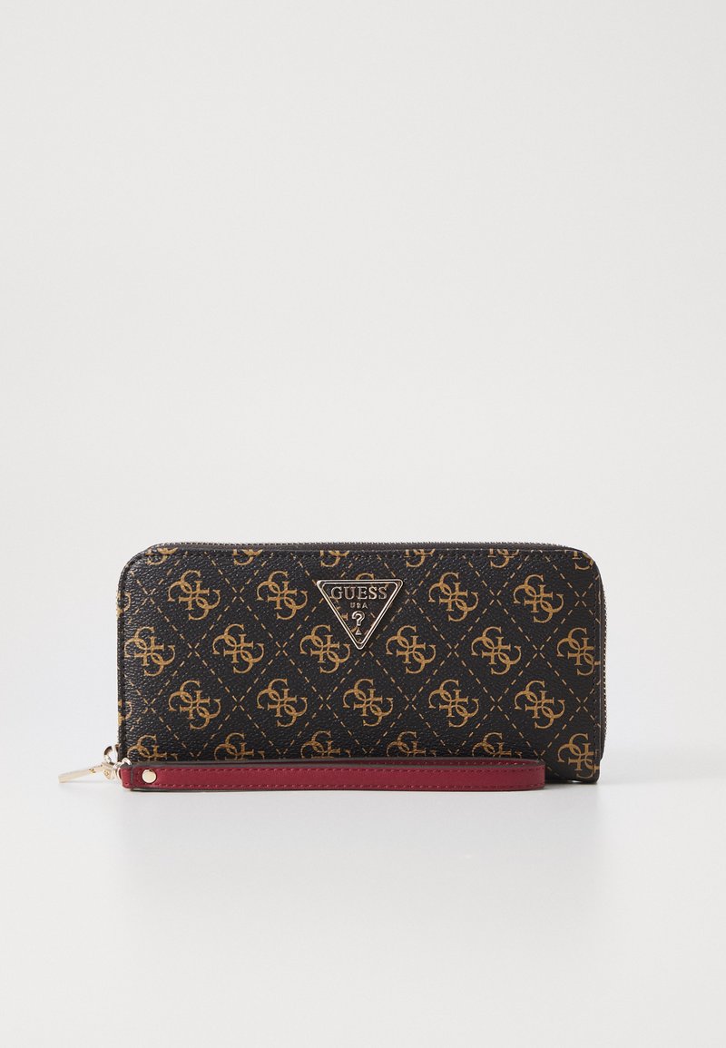 Portafoglio nero con motivo a monogramma in oro. Presenta un accento bordeaux e una placca logata in argento. Chiusura con zip e manico per il polso.