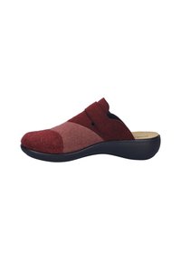 Red and pink felt clogs with a low black sole, rounded toe, and adjustable strap across the midfoot for secure fit.