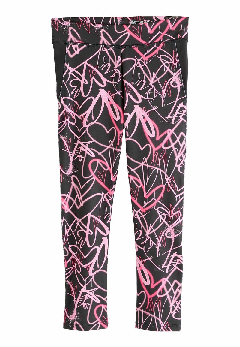 Svarta tights med ett rosa abstrakt hjärttryck, med en figurnära design och en elastisk midja för komfort.