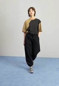 Jordan PANT - Pantalones deportivos - black