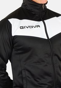 Black track jacket with white panel on chest; features high collar and embroidered "GIVOVA" logo. Smooth texture, full zip closure.