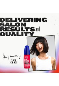 Woman with short black hair turning head, red and blue Bed Head heat protection spray shown, bold text about delivering salon results and quality.