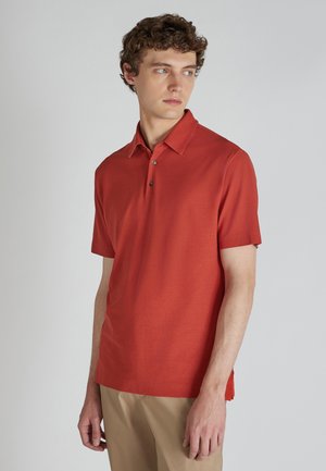 - Koszulka polo