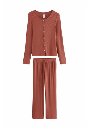 Rust-colored, ribbed lounge set featuring a long-sleeve button-up top with round neckline and loose-fit drawstring pants.