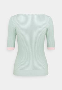 Haut à manches courtes côtelé vert menthe avec un col rond et des accents roses aux poignets des manches. Conception ajustée avec un tissu texturé.