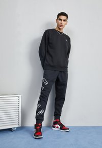 Jordan Pantaloni sportivi - black