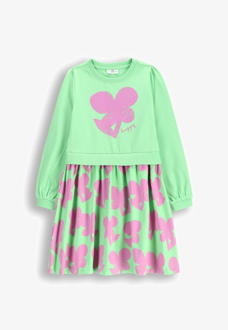 Zielona sukienka z długimi rękawami, z różowym wzorem serca i napisem "szczęśliwy". Spódnica ma powtarzający się wzór różowych motyli.