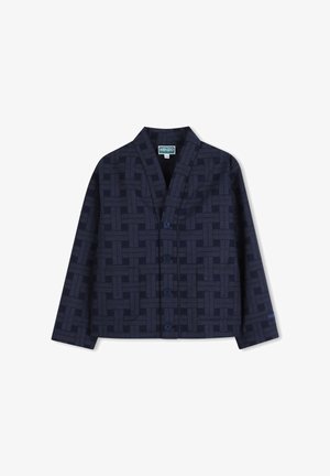 Veste boutonnée bleu marine à motif en espagnole, manches longues, col et étiquette Kenzo au niveau de la nuque arrière et du poignet gauche.