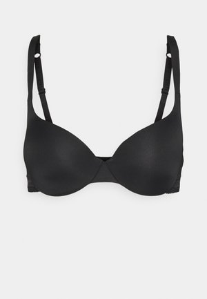 Svart bh med formede kopper, justerbare tynne stropper og krok-lukking. Jevn tekstur med minimal detaljer og sømløst design.