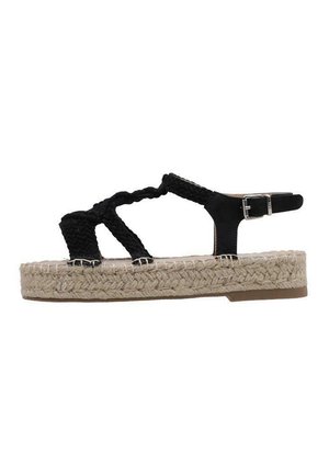 Sandalias negras de tiras trenzadas con correa ajustable en el tobillo, plantilla de yute trenzado y una plataforma texturizada en beige.