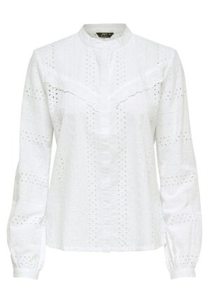 Blouse blanche à manches longues avec motifs en dentelle ajourée, détail à volants sur la poitrine, col mandarin et devant boutonné.