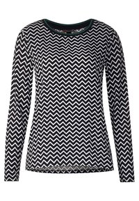 Dlouhý rukáv top v černo-bílé zigzagové vzoru, s zaobleným výstřihem a zeleným lemem a přiléhavým střihem. Měkká textilie.
