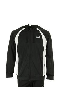 Juodas sportinis zip-up džemperis su baltais akcentais, pagamintas iš sklandžios medžiagos, turintis gobtuvą, elastingas rankogalius ir mažą logotipą krūtinėje.