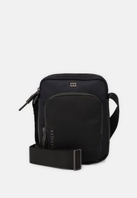 Tommy Hilfiger COMMUTER MINI REPORTER - Umhängetasche - space blue
