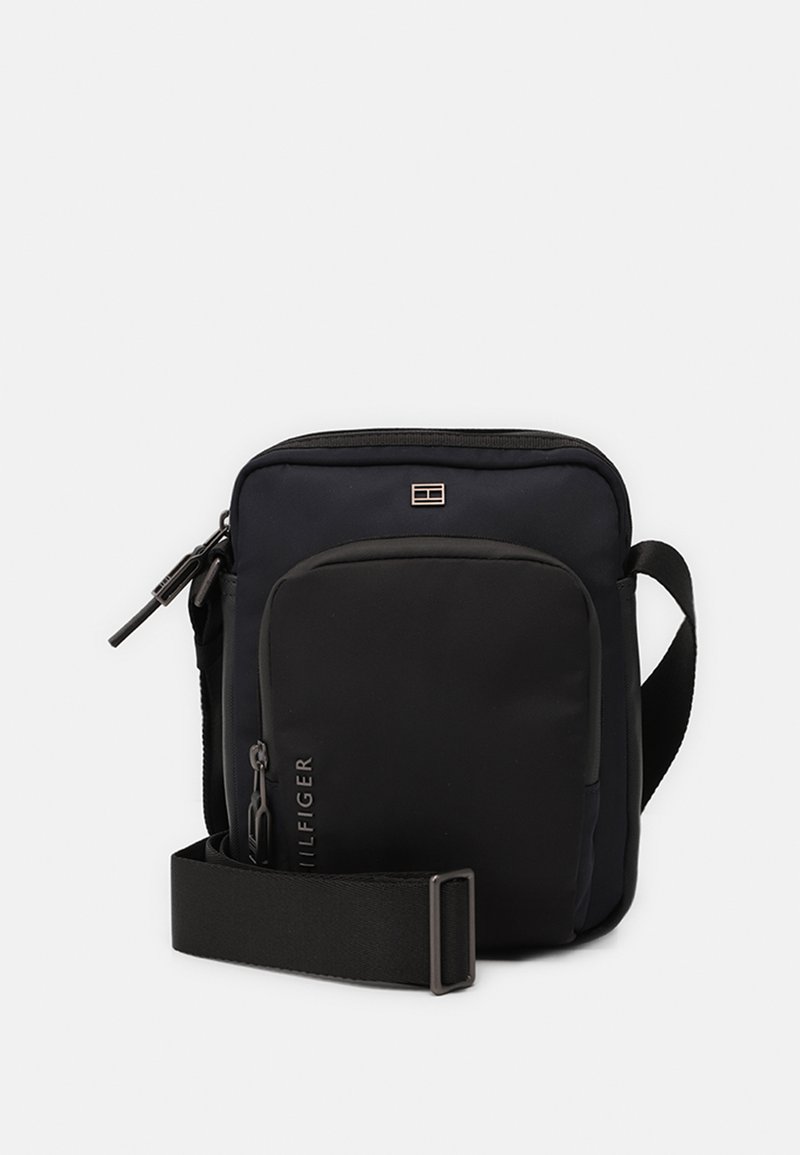 Tommy Hilfiger COMMUTER MINI REPORTER - Umhängetasche - space blue