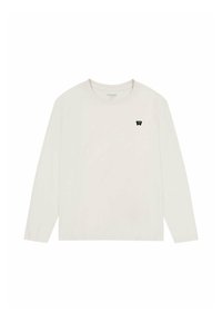 Długi rękaw kremowa koszulka z bawełny, z okrągłym dekoltem i małym czarnym logo na lewej piersi. Gładka faktura.