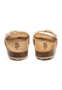 Sandales en tongs beige avec une semelle en liège, des brides en cuir lisse et une boucle en métal. Semelle texturée pour une meilleure adhérence. Taille 37.