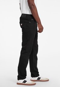 Guess Jeans SLIM  - Slimfit džínsy - schwarz