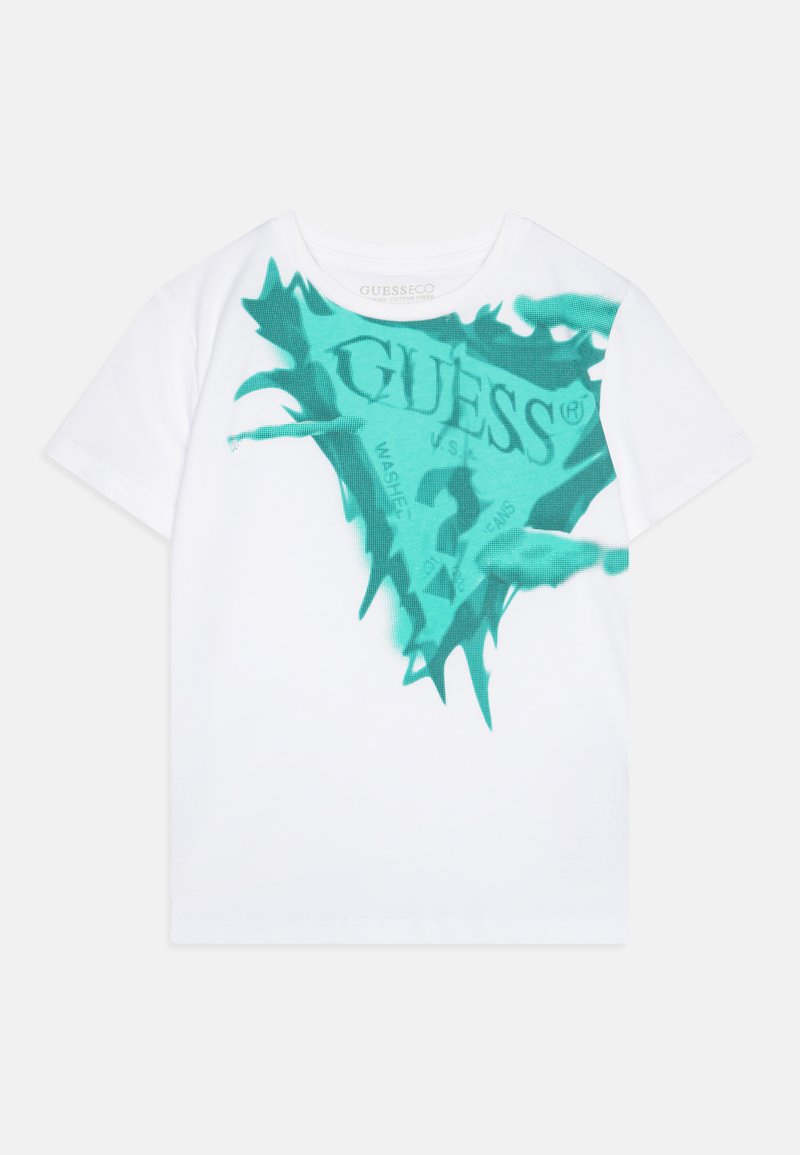 Hvid bomulds T-shirt med et turkis grafisk design, hvor teksten "GUESS" er fremhævet med en slidt effekt. Kortærmet, rund halsudskæring.