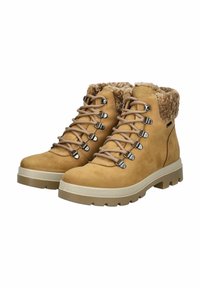 Tan hiking boots with a suede upper, faux fur collar, metal eyelets, and contrasting rubber outsole. Features a lugged sole for traction.