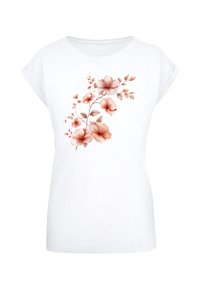 White short-sleeve t-shirt featuring a floral design in soft pink and peach tones. Smooth cotton texture with a relaxed fit.
