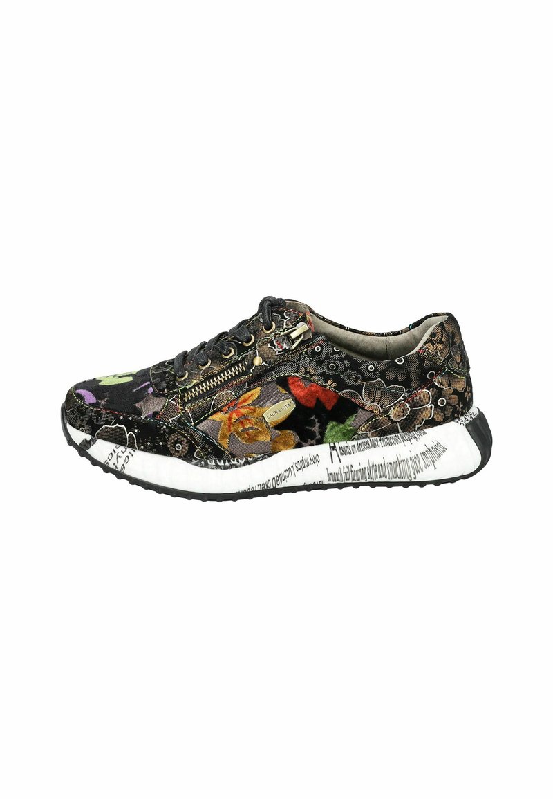 Zapatilla de lona negra con patrones florales multicolores, adornada con una cremallera y una suela blanca intermedia con detalles de texto. Suela texturizada negra.