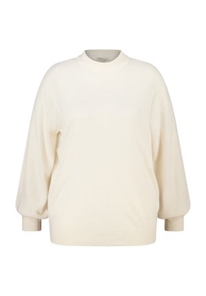 Pull en maille couleur crème avec un col rond, une silhouette ample et des poignets et un ourlet subtilement côtelés pour une texture supplémentaire.